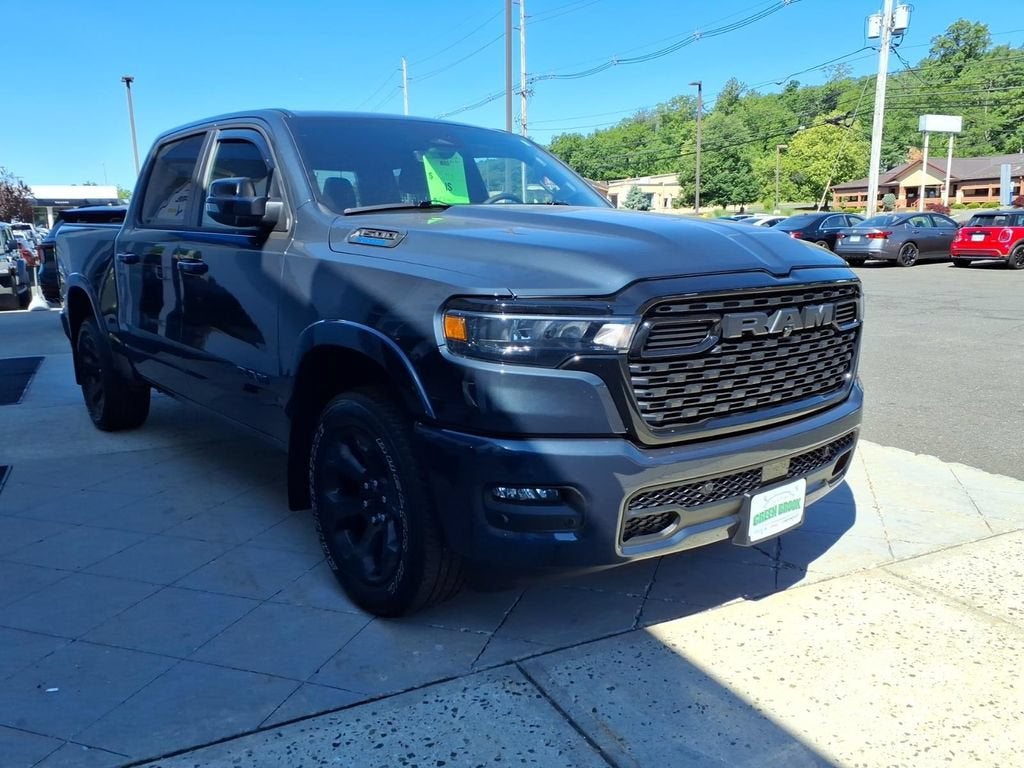 2025 RAM 1500 Big Horn in Gray — front three-quarter view