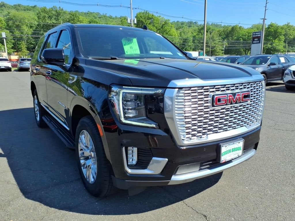 2023 GMC Yukon Denali in Onyx Black — front three-quarter view