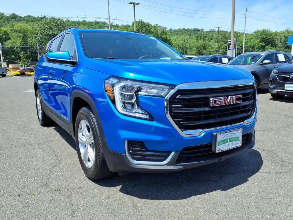 2024 GMC Terrain SLE in Riptide Metallic — front three-quarter view
