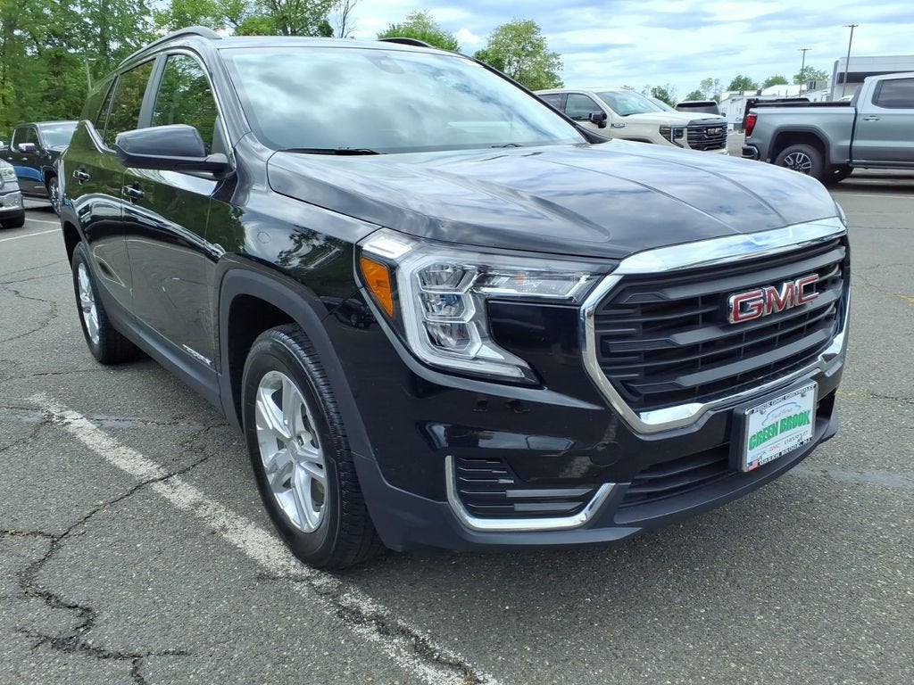 2023 GMC Terrain SLE in Ebony Twilight Metallic — front three-quarter view