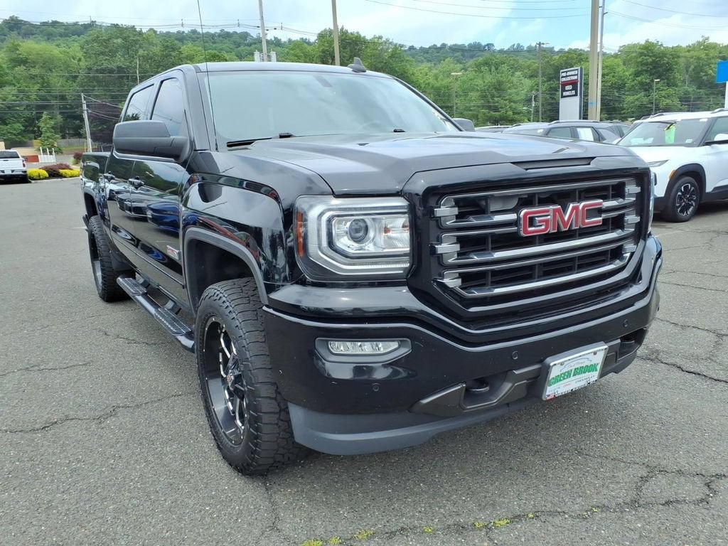 2017 GMC Sierra 1500 SLT in Onyx Black — front three-quarter view