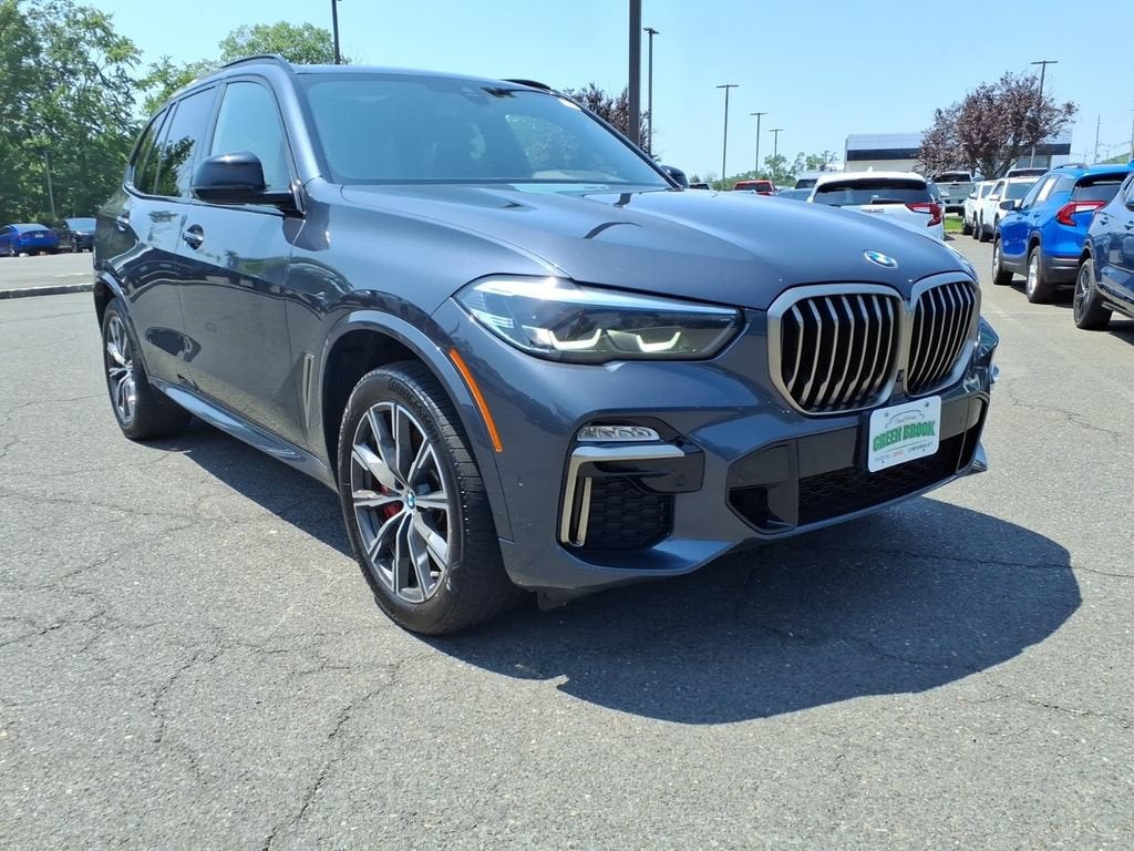 2021 BMW X5 M50i in Gray — front three-quarter view