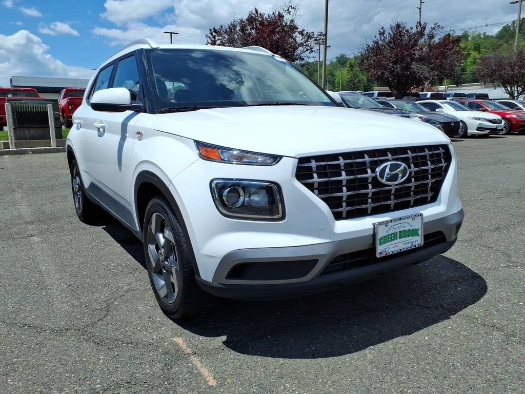 2024 Hyundai Venue SEL in White — front three-quarter view