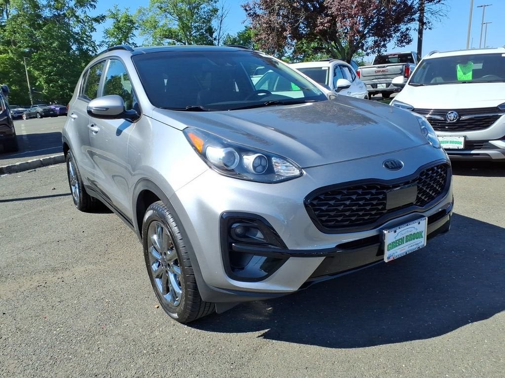 2022 Kia Sportage Nightfall in Silver — front three-quarter view
